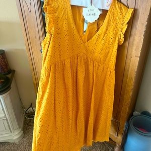Mustard yellow size large eyelet dress perfect for fall rodeo and boot season.